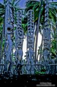 Travel photography:Tikis  at Pu`uhonua o Honaunau National Historical Park, Hawaii USA