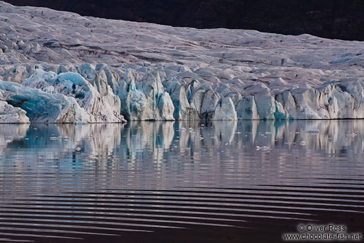 Edge of the Vatnajökull glacier calving into Breiðárlón lake