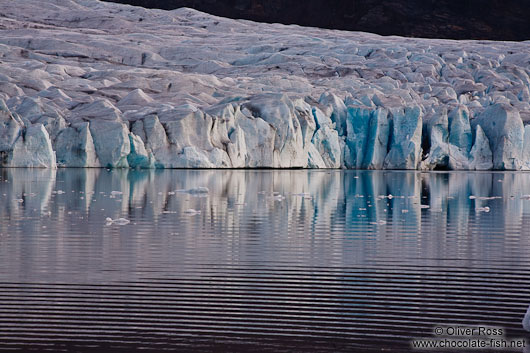 Edge of the Vatnajökull glacier calving into Breiðárlón lake