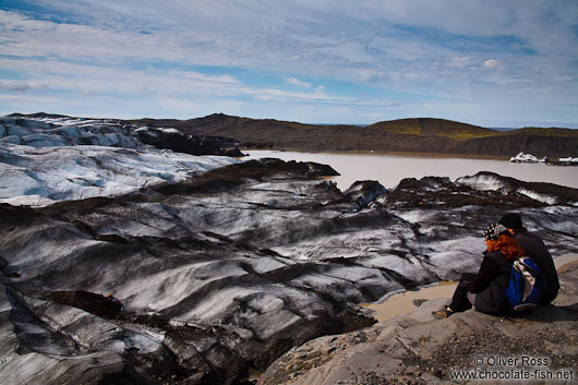 Tourists enjoy the view of Svinafellsjökull