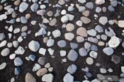 Travel photography:Pebbles on the beach at Jökulsárlón, Iceland