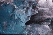 Travel photography:Detail of an iceberg washed up at the beach near Jökulsárlón, Iceland