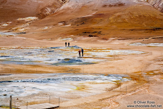 Geothermal field at Hverarönd with fumaroles and mud pools