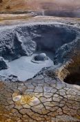 Travel photography:Boiling mud in the geothermal area at Hverarönd, Iceland