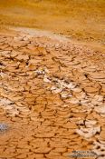 Travel photography:Cracked soil in the geothermal area at Hverarönd near Mývatn, Iceland