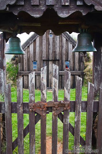 View of Grafarkirkja church thorugh the entrance gate