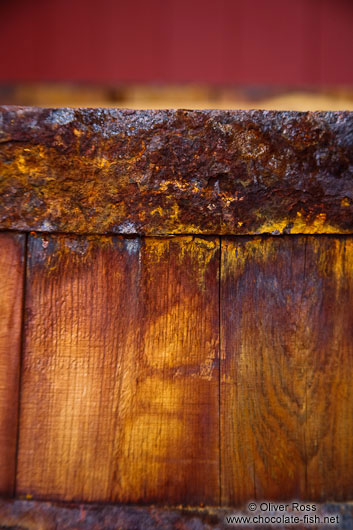 Detail of the rusty rim of a barrel outside the Siglufjörður herring museum