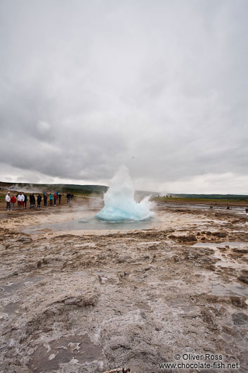 A geysir erupts at the Geysir Centre on the Golden Circle tourist route