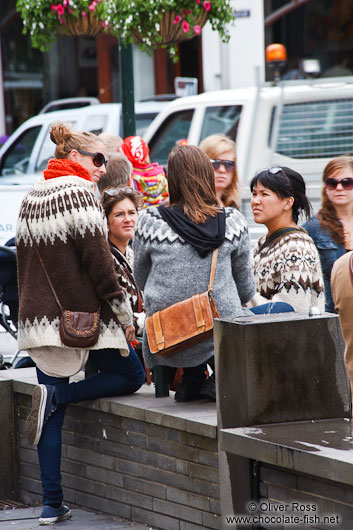Tourists in traditional Icelandic sweaters in Reykjavik