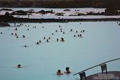 Travel photography:People enjoy the mineral rich waters at the Blue Lagoon (Bláa Lónið), Iceland