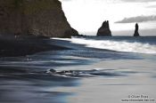 Travel photography:Rocks in the sea at Vik, Iceland