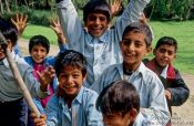 Travel photography:Srinagar kids competing for the best spot in front of the camera, India