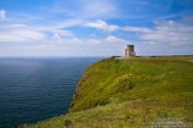 Travel photography:O'Brien's Tower stands high on the Clare Cliffs of Moher , Ireland