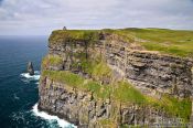 Travel photography:The Cliffs of Moher with O'Brien's tower, Ireland