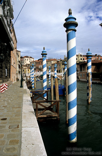 Gondola poles in Rio de Canareggio near Ponte Guglie in Venice