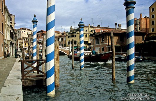 Gondola poles in Rio de Canareggio near Ponte Guglie in Venice