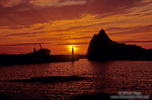 Sunset behind a light house on Hokkaido