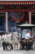 Travel photography:Visitors in Tokyo´s Senso-ji temple in Asakusa, Japan