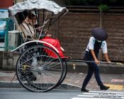 Travel photography:Female rickshaw puller in Tokyo Asakusa, Japan