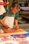 Travel photography:Cutting fish at the Tokyo Tsukiji fish market, Japan