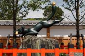 Travel photography:Sculpture at the gate to Kyoto`s Inari shrine, Japan