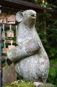 Travel photography:Mouse with scroll sculpture at Kyoto´s Otoyo shrine, Japan