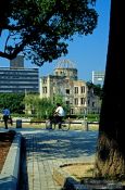 Travel photography:Cyclist in front of The Atomic Bomb Dome in Hiroshima, Japan