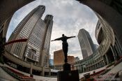 Travel photography:Statue with Tokyo Metropolitan Government Building in Shinjuku, Japan