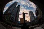 Travel photography:Statue with Tokyo Metropolitan Government Building in Shinjuku, Japan