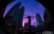 Travel photography:Statue with Tokyo Metropolitan Government Building in Shinjuku at sunset, Japan