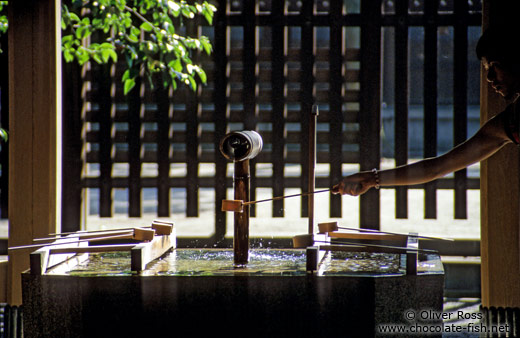 Ritual water fountain outside Tokyo`s Meiji Shrine