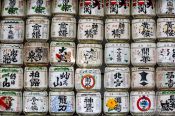 Travel photography:Painted sake barrels wrapped in straw at Tokyo´s Meiji shrine, Japan