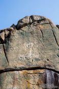 Travel photography:Image of the seated Yeorae carved on rock in the Namsan mountain, South Korea