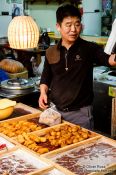 Travel photography:Food vendor at Gyeongju market, South Korea