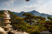 Travel photography:Seated stone Buddha at Yongjangsa in the Namsan mountains, South Korea