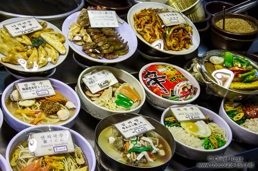 Food dishes for sale at a restaurant on the Seoul night market