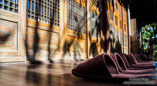 Slippers aligned outside a traditional house in Seoul Samcheonggak