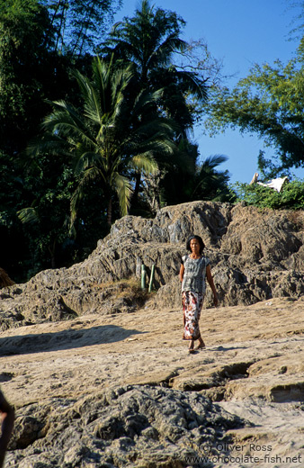 Woman on the banks of the Mekong River