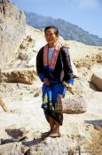 Travel photography:Woman on the banks of the Mekong River, Laos