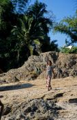 Travel photography:Woman on the banks of the Mekong River, Laos