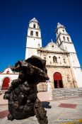 Travel photography:Campeche church with sculpture by Mexican artist Jose Luis Cuevas, Mexico