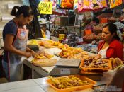 Travel photography:Selling chicken at the Oaxaca market, Mexico
