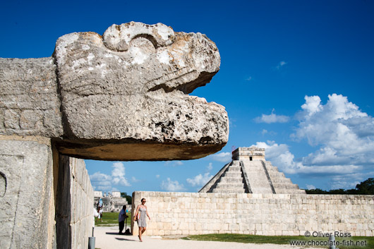 Snake head with Central pyramid at the Chichen Itza archeological site