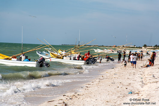 Fishing boats return to Celestun beach