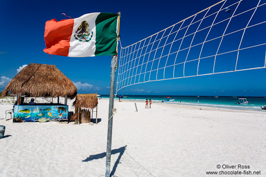 Volleyball net with Mexican flag at Tulum beach