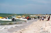 Travel photography:Fishing boats return to Celestun beach, Mexico