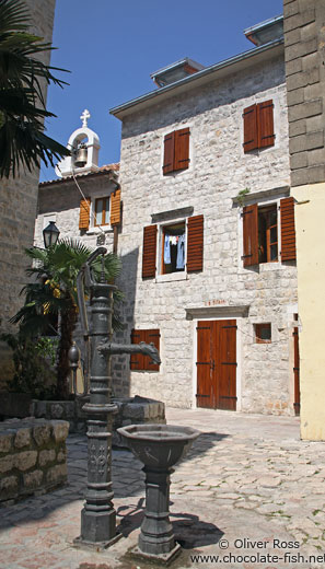 Fountain and houses in Kotor
