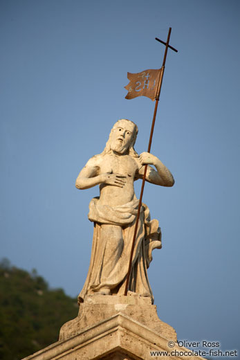 Figure atop a baroque palace in Perast dating from the Venetian period