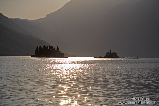 St. George and Sv. Djordje (St. George) and Gospa od Škrpjela (Our Lady of the Rock) within Boka Kotorska at sunset