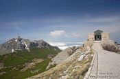 Travel photography:View of the two peaks of Mount Lovćen named Štirovnik (1749 m) and Jezerski vrh (1657 m) with Njegoš-Mausoleum, Montenegro